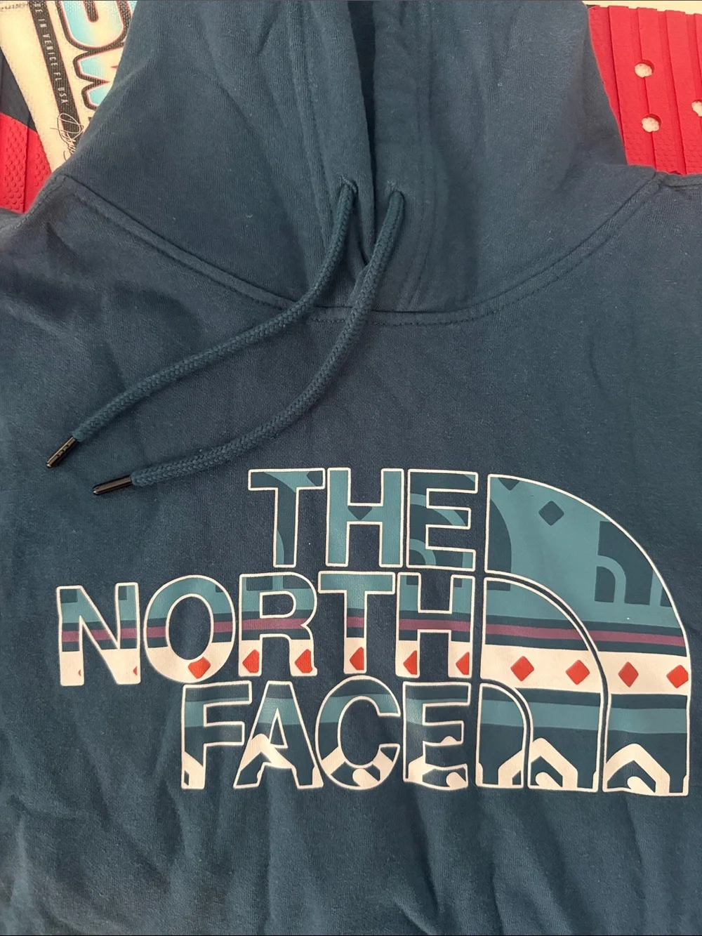 The North Face Men's Dark Blue Pullover Hoodie with Patterned Logo